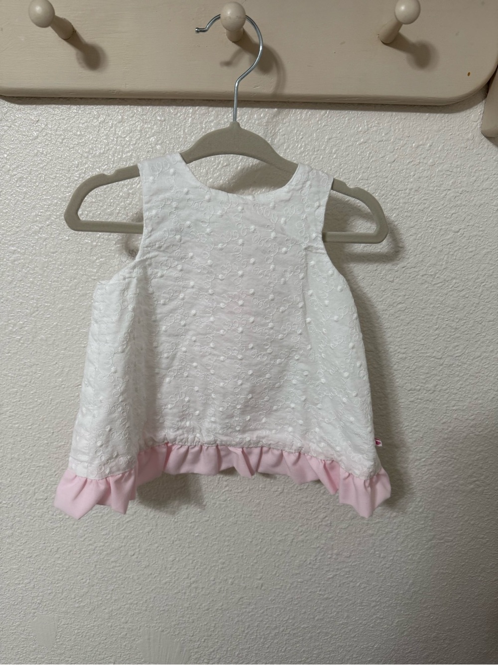 Ruffle Butts White Baby outfit with Pink Ruffle Accents